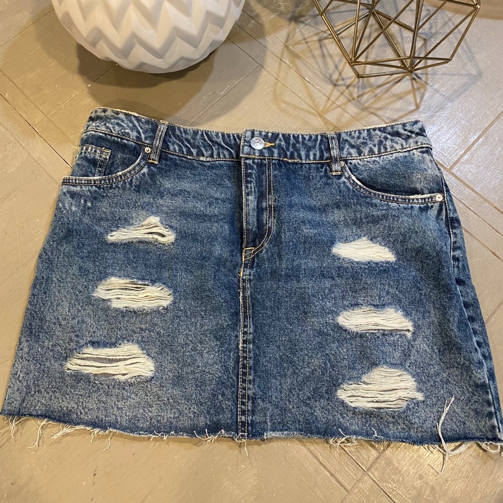 Divided women’s destructed jean skirt size 12